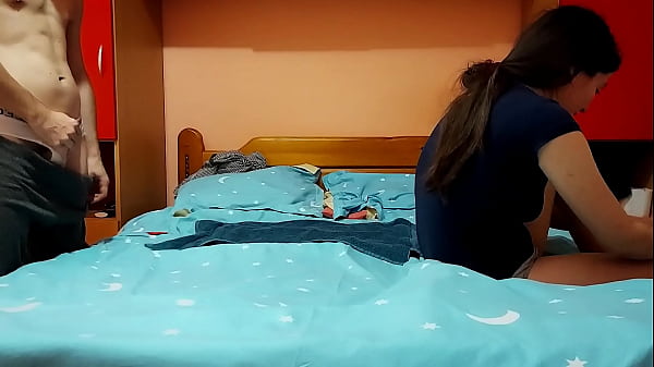 Young horny couple having fun in the bedroom